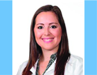 Dr Ortiz smiling in her white lab coat